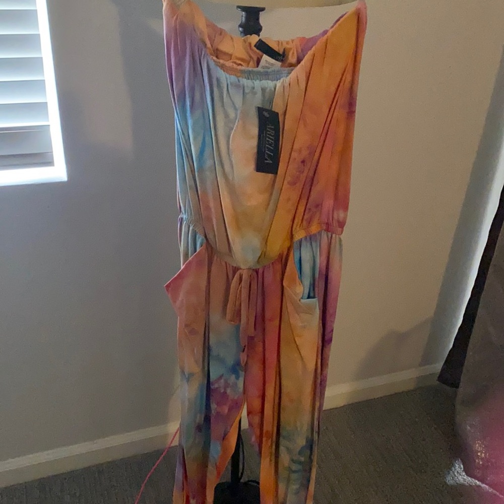 Tie dye jump suit size small and size medium